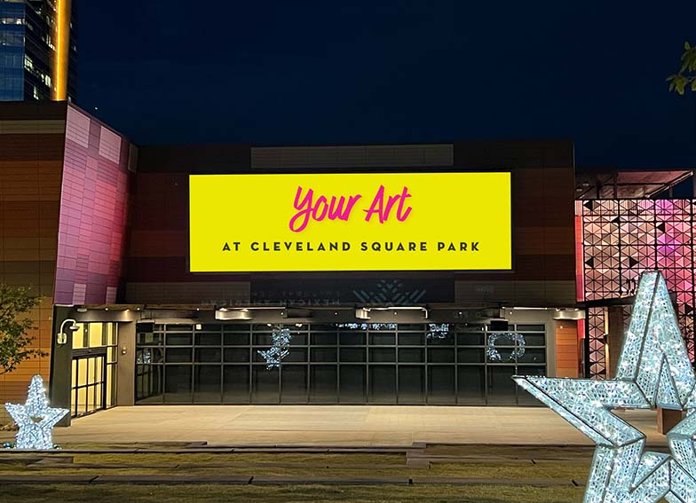 Light up sign outside of MACC with your art here displayed.